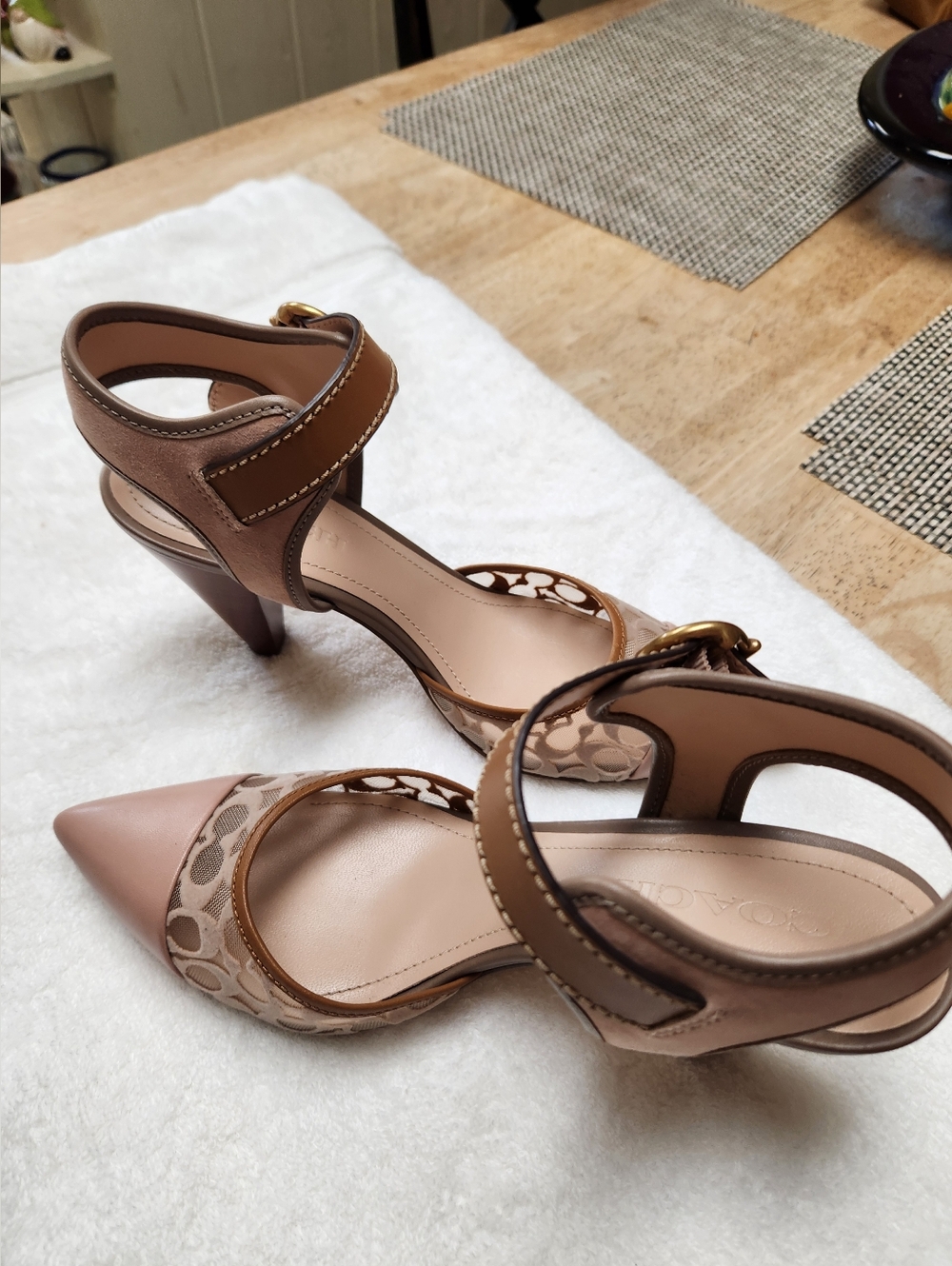 Coach cone heels.